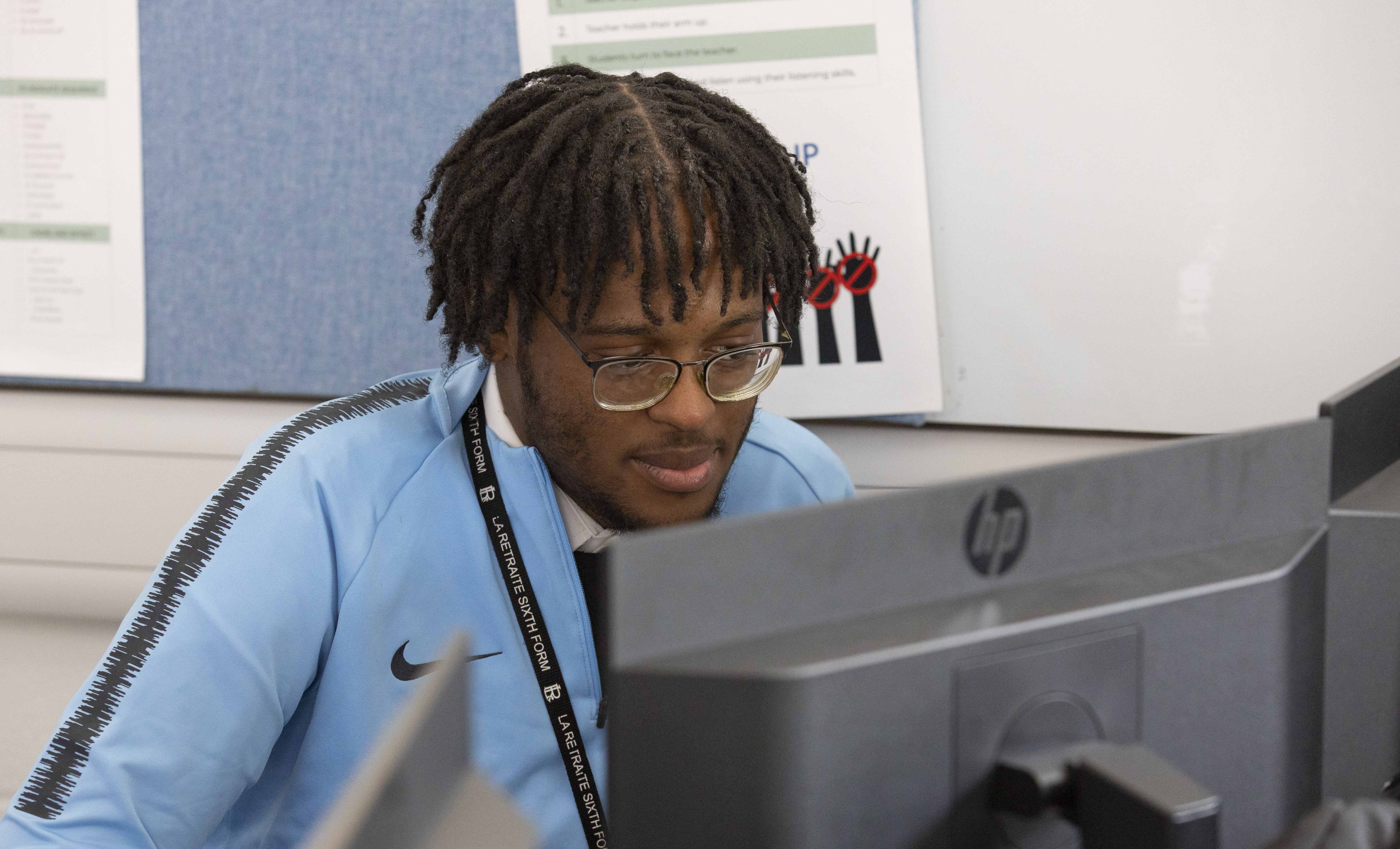 Teacher working at a computer